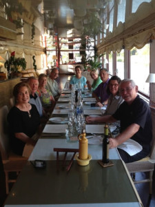 Passengers aboard Le Phenicien await dinner. Meals are planned to pair with the wines that travelers have tasted during the day at local vineyards along the Rhone River.
